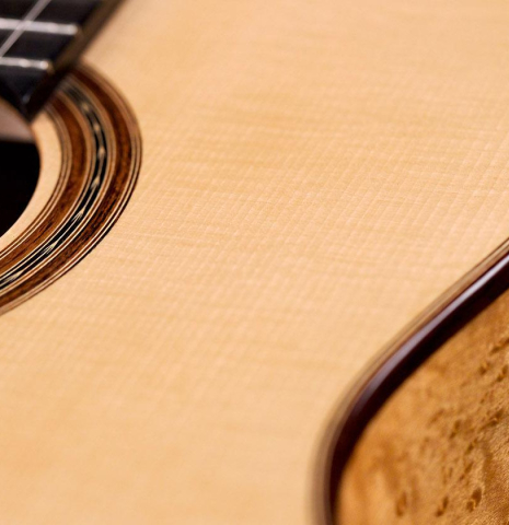 The soundboard of a 2019 Youri Soroka "Torres" classical guitar made with spruce and maple.