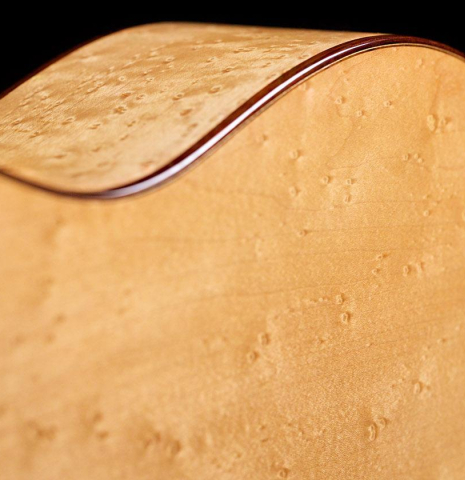 The back and sides of a 2019 Youri Soroka "Torres" classical guitar made with spruce and maple.