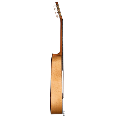 The side of a 2019 Youri Soroka "Torres" classical guitar made with spruce and maple.