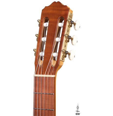 The headstock of a 2020 Youri Soroka classical guitar made with spruce top and maple back and sides.