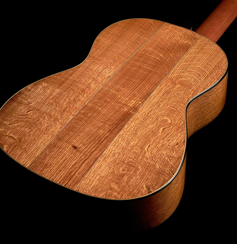 The back and sides of a 2022 Youri Soroka &quot;Templars Oak&quot; classical guitar made with spruce and oak