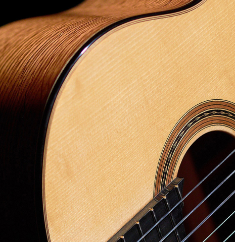 The soundboard of a 2022 Youri Soroka &quot;Templars Oak&quot; classical guitar made with spruce top and oak back and sides