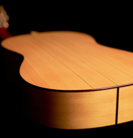 The back and sides of a 2022 Youri Soroka &quot;Torres&quot; classical guitar made with spruce and cypress wood.