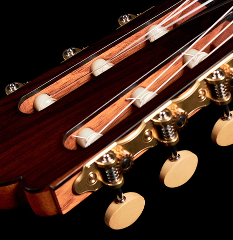 The Torres-style headstock of a 2022 Youri Soroka classical guitar