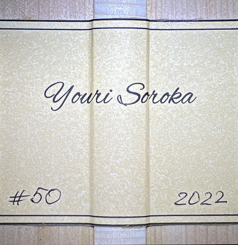 The label of a 2022 Youri Soroka &quot;Torres&quot; classical guitar on a white background