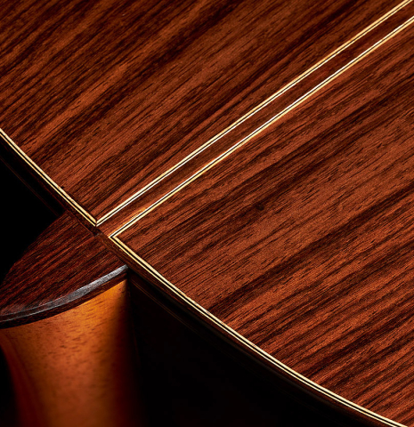 The back, heel and center seam purfling of a 2023 Youri Soroka "1924 Santos, ex Segovia" classical guitar made of spruce and Indian rosewood