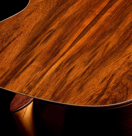 The heel, back binding and purfling of a 2025 Youri Soroka classical guitar made of spruce and African rosewood