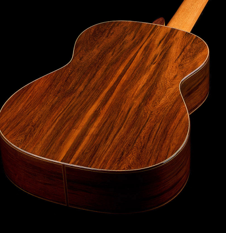 The back and sides of a 2025 Youri Soroka classical guitar made of spruce and African rosewood