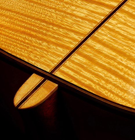 The back, heel and purfling of a 2021 Gary Southwell "1940 'Augustine' Hauser, ex-Bream" classical guitar made of spruce and maple
