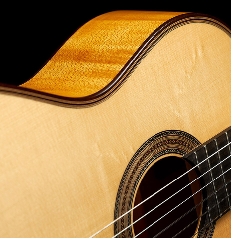 The soundboard and side of a 2021 Gary Southwell "1940 'Augustine' Hauser, ex-Bream" classical guitar made of spruce and maple