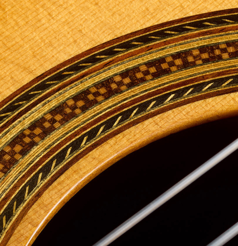 Closeup of the rosette of a 2001 Gary Southwell "1940 'Augustine' Hauser, ex-Bream" classical guitar made of spruce and Indian rosewood
