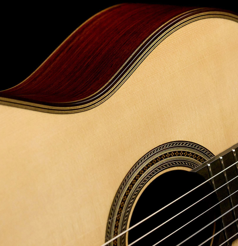 The soundboard and rosette of a 2025 Gary Southwell "1940 'Augustine' Hauser, ex-Bream" classical guitar made of spruce and Indian rosewood