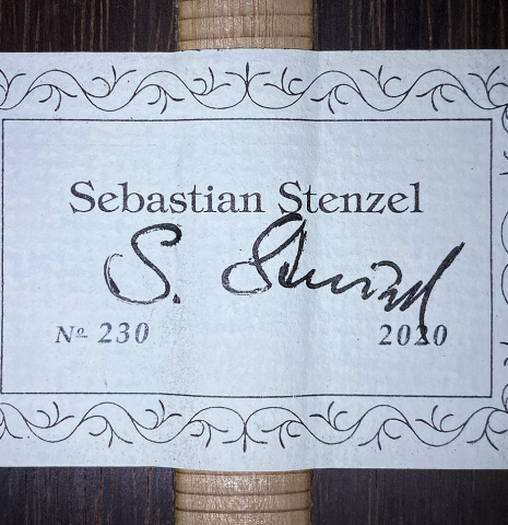 The label of a 2020 Sebastian Stenzel &quot;Enhanced Wood&quot; classical guitar made with cedar and CSA rosewood.