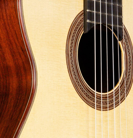 The soundboard and side of a 2015 Annette Stephany classical guitar made with spruce and Indian rosewood