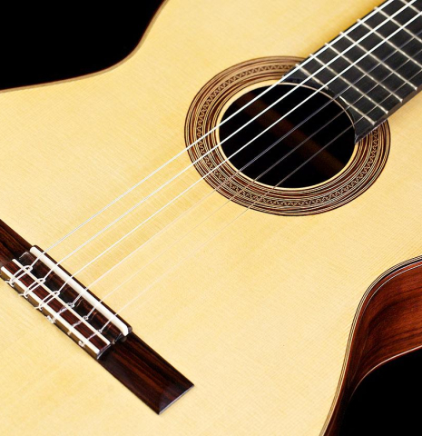 The front of a 2015 Annette Stephany classical guitar made with spruce and Indian rosewood
