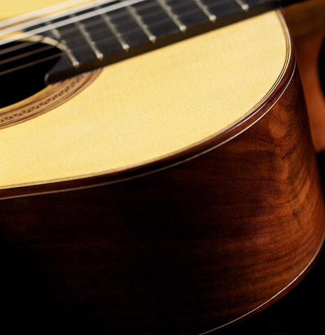 The side of a 2015 Annette Stephany classical guitar made with spruce and Indian rosewood