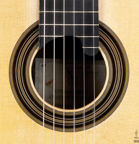 The rosette of a 2017 Annette Stephany classical guitar made of spruce and Indian rosewood