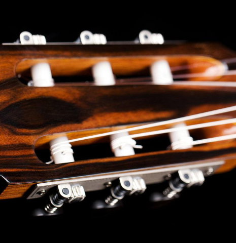 The headstock and tuning machines of a 2017 Annette Stephany classical guitar made of spruce and Indian rosewood