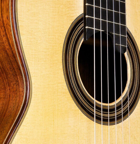 The top and rosette of a 2017 Annette Stephany classical guitar made of spruce and Indian rosewood
