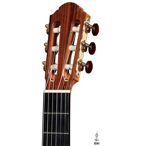 The headstock of a 2000 Sebastian Stenzel classical guitar made with cedar and Indian rosewood