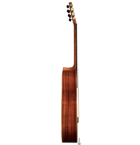 The side of a 2000 Sebastian Stenzel classical guitar made with cedar and Indian rosewood