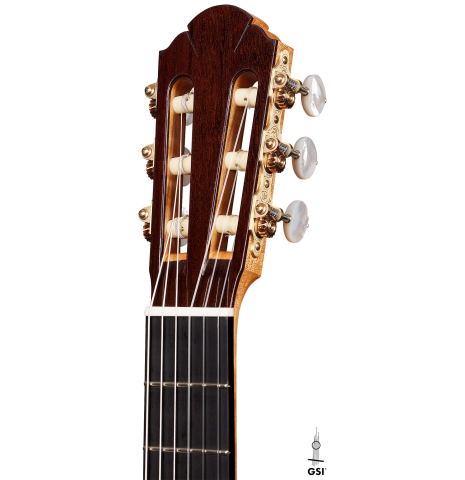 The headstock of a 2024 Sebastian Stenzel classical guitar made of cedar and maple