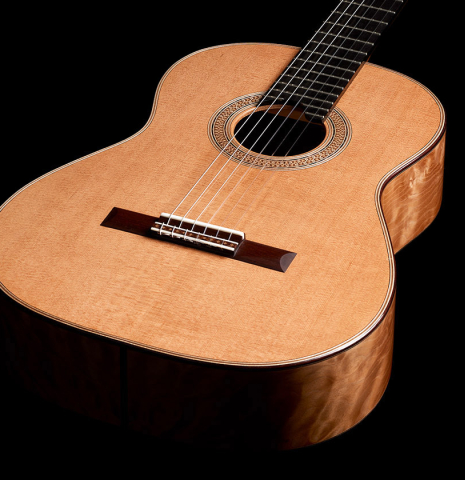 The soundboard and sides of a 2024 Sebastian Stenzel classical guitar made of cedar and maple