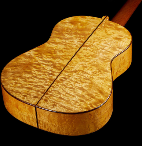 The back and sides of a 2023 Sebastian Stenzel classical guitar made of spruce and maple
