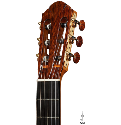 The headstock of a 2023 Sebastian Stenzel classical guitar made of spruce and maple