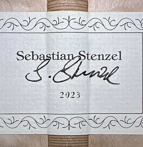 The label of a 2023 Sebastian Stenzel classical guitar made of spruce and maple