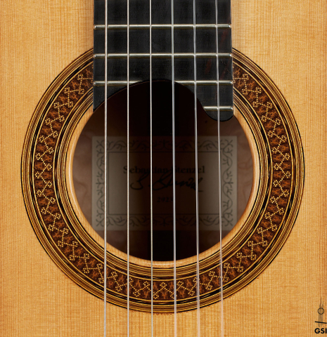 The rosette of a 2023 Sebastian Stenzel classical guitar made of spruce and maple