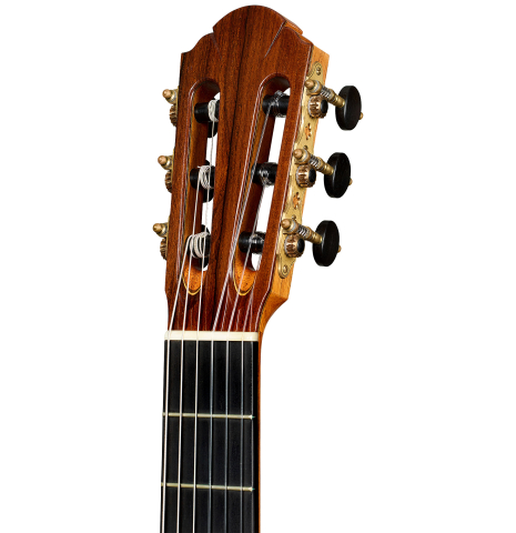 The headstock of a 2010 Sebastian Stenzel classical guitar made of spruce and African rosewood