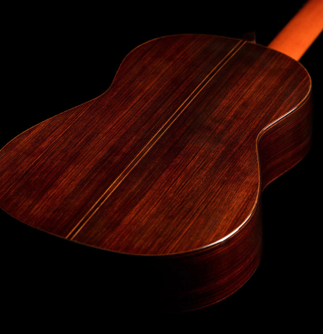 The back and sides of a 2022 Giovanni Tacchi classical guitar Friederich model made of cedar and Indian rosewood