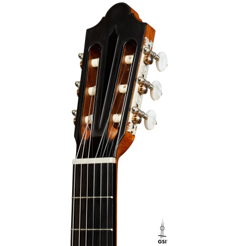 The headstock of a 2024 Giovanni Tacchi classical guitar Friederich model made of cedar and Indian rosewood