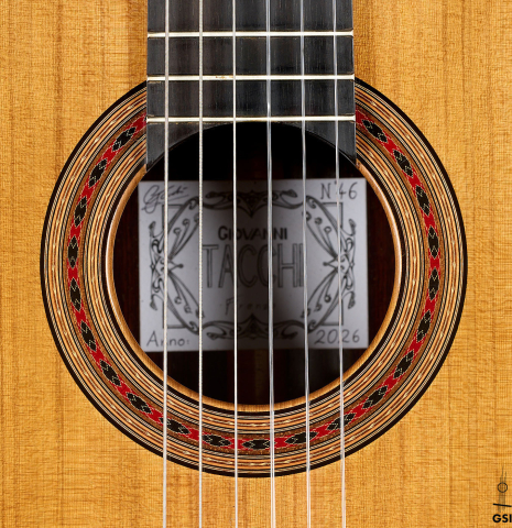 The rosette of a 2026 Giovanni Tacchi classical guitar made of cedar and Indian rosewood