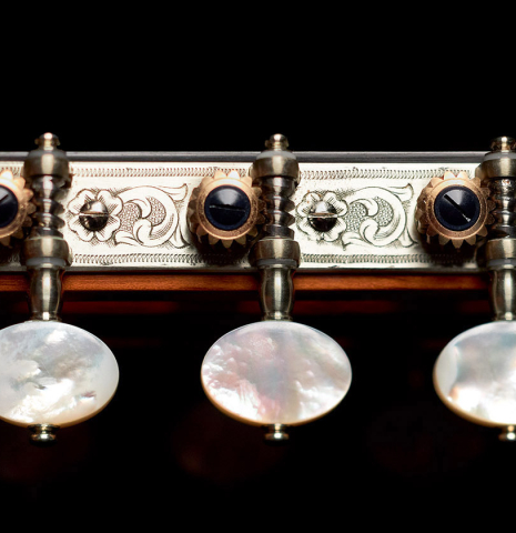 The machine heads of a 2022 Andrea Tacchi "Homage to the Spanish School" classical guitar made with spruce and cypress wood