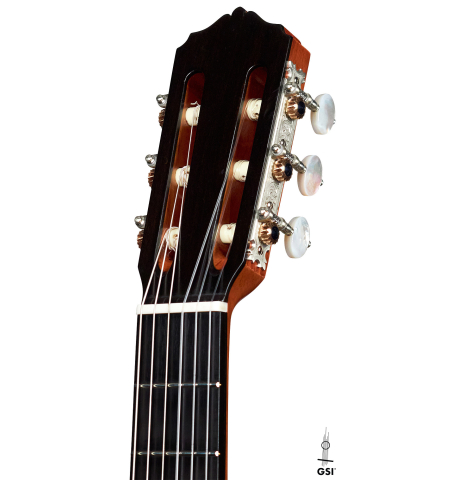 The headstock and tuners of a 2022 Andrea Tacchi "Homage to the Spanish School" classical guitar made with spruce and cypress wood