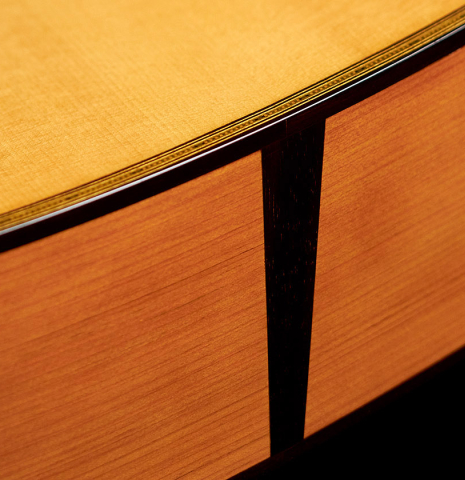 The back and sides of a 2022 Andrea Tacchi "Homage to the Spanish School" classical guitar made with spruce and cypress wood