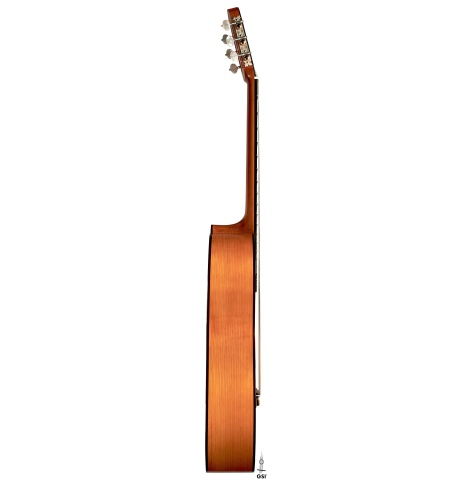 The side of a 2022 Andrea Tacchi &quot;Homage to the Spanish School&quot; classical guitar made with spruce and cypress wood