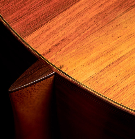The heel of a 2007 Andrea Tacchi &quot;Coclea Thucea&quot; made with CSA rosewood back and sides and cedar/spruce soundboard.