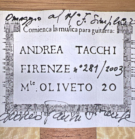The label of a 2003 Andrea Tacchi &quot;Omaggio a Francisco Simplicio&quot; classical guitar made of spruce and satwinwood