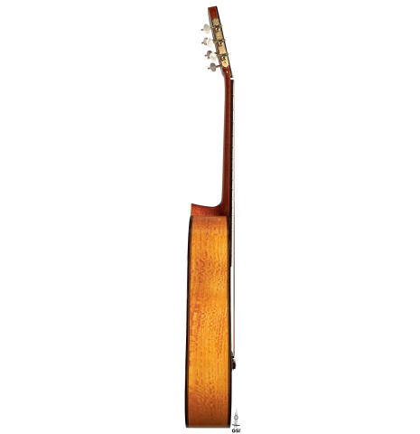 The side of a 2003 Andrea Tacchi &quot;Omaggio a Francisco Simplicio&quot; classical guitar made of spruce and satwinwood