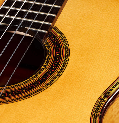 The top and rosette of a 2003 Andrea Tacchi &quot;Omaggio a Francisco Simplicio&quot; classical guitar made of spruce and satwinwood
