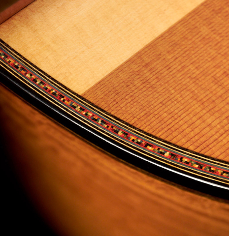 The purfling of a 2023 Andrea Tacchi "Coclea Thucea - Alter Ego" classical guitar.