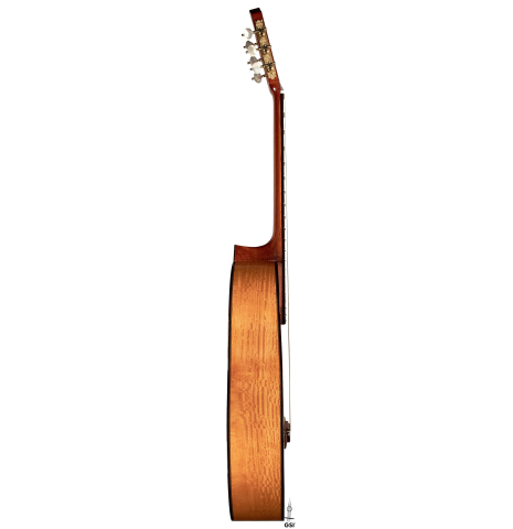The side of a 2023 Andrea Tacchi "Coclea Thucea - Alter Ego" classical guitar.