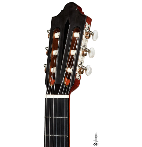 The headstock of a 2020 Giovanni Tacchi classical guitar Friederich model made of cedar and Indian rosewood