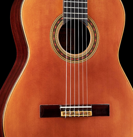 The front of a 2020 Giovanni Tacchi classical guitar Friederich model made of cedar and Indian rosewood