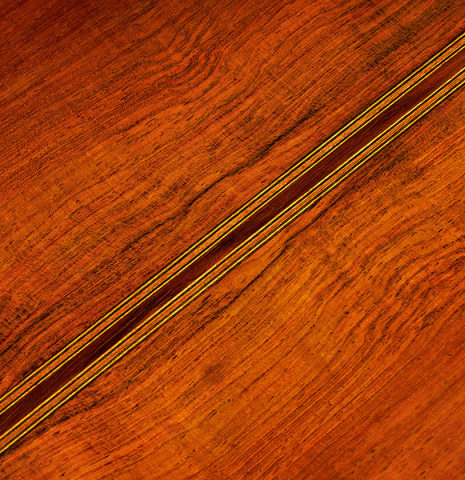 Detail of the back center seam of a 2006 Andrea Tacchi "Omaggio a Francisco Simplicio" classical guitar made of spruce and CSA rosewood