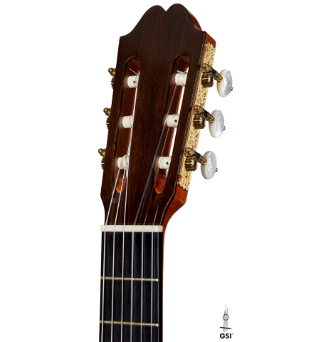 The headstock of a 2010 Andrea Tacchi "Omaggio a Robert Bouchet" classical guitar made of spruce and CSA rosewood