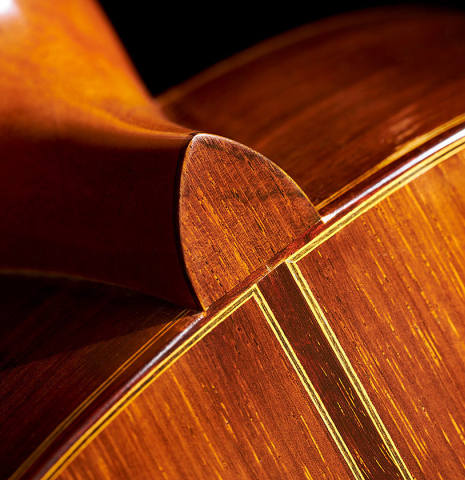 The heel and back purfling of a 2010 Andrea Tacchi "Omaggio a Robert Bouchet" classical guitar made of spruce and CSA rosewood